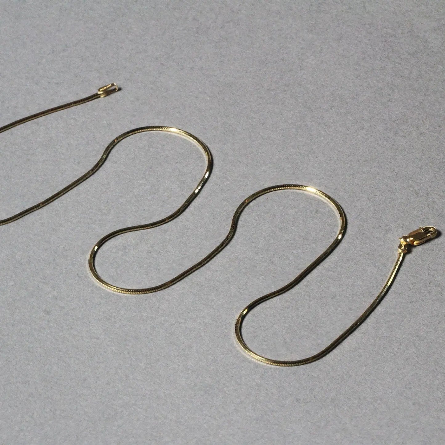 1.0mm 14K Yellow Gold Octagonal Shiny Snake Chain RCJ Chains  CELESTIA LUXE JEWELLERS