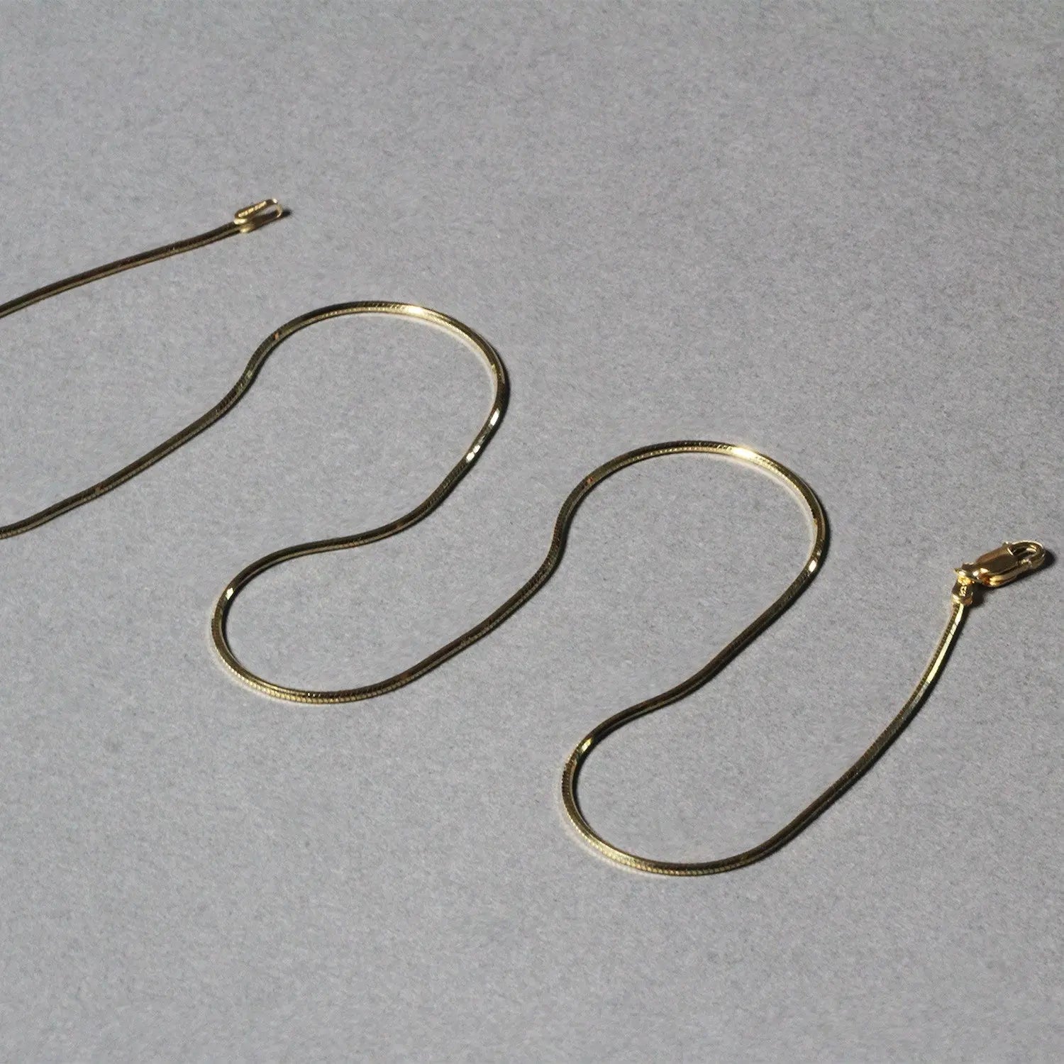 1.0mm 14K Yellow Gold Octagonal Shiny Snake Chain RCJ Chains  CELESTIA LUXE JEWELLERS