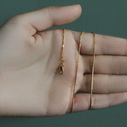 1.0mm 14K Yellow Gold Octagonal Shiny Snake Chain RCJ Chains  CELESTIA LUXE JEWELLERS